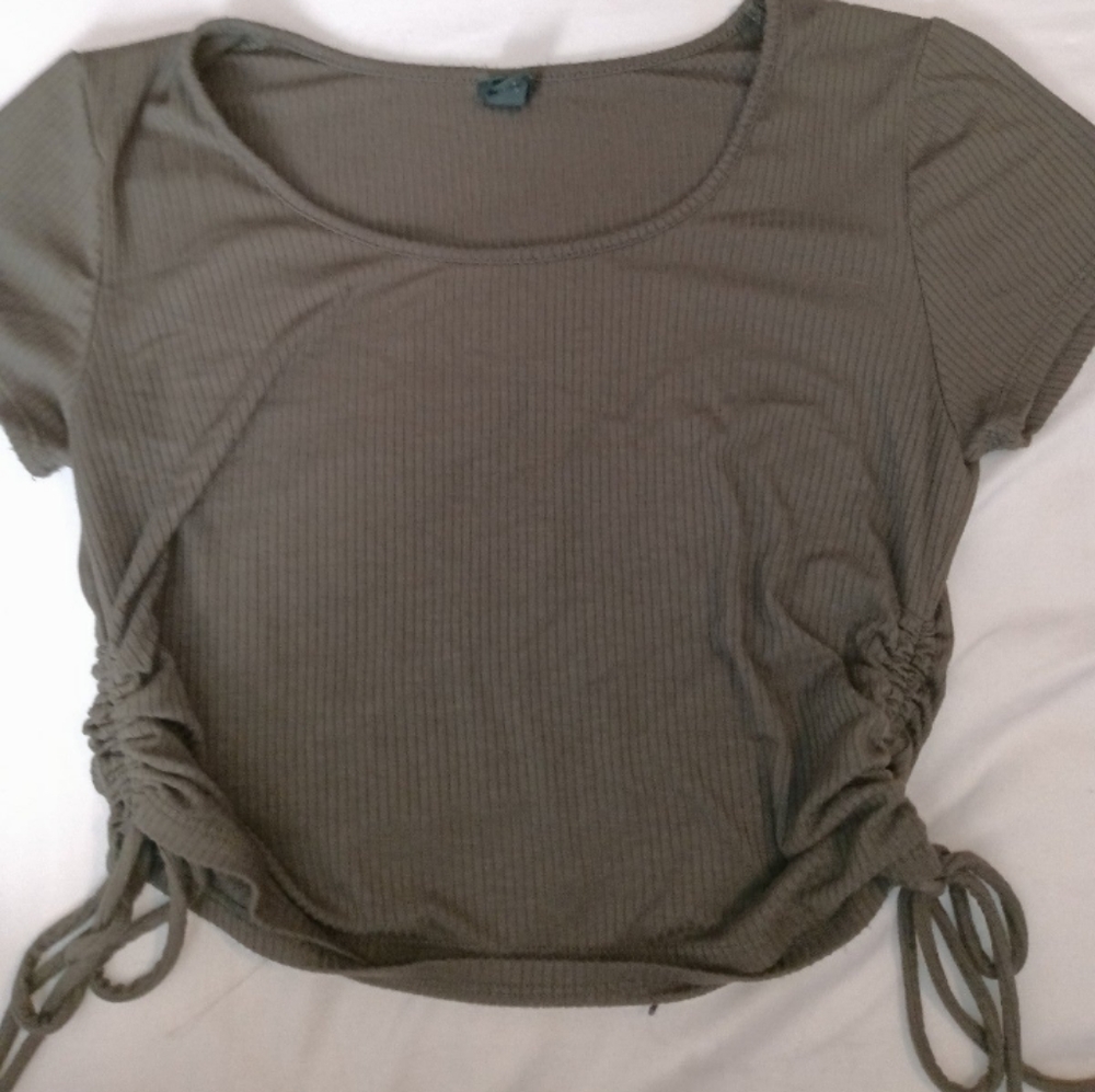 A green crop top